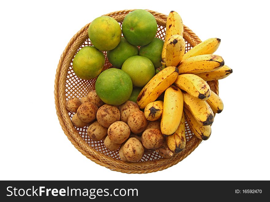 Set of Traditional Tropical Thai Fruit, Orange Banana and Longan, in Basket