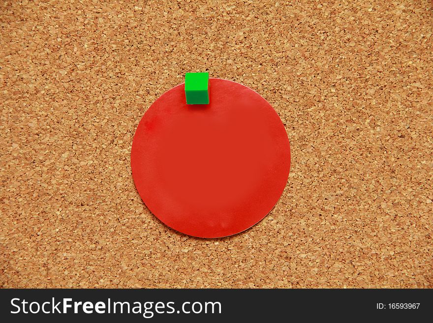 Corkboard background with red paper