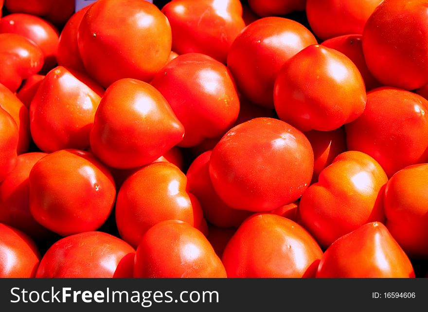 Red tomato pile.Picture taken right at the market. Red tomato pile.Picture taken right at the market.