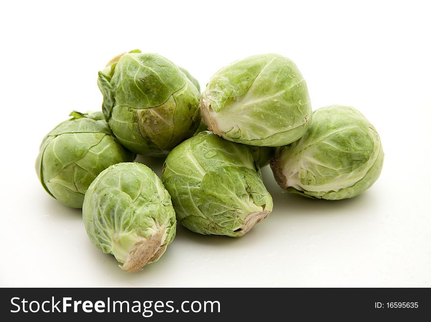 Brussels sprouts onto white background