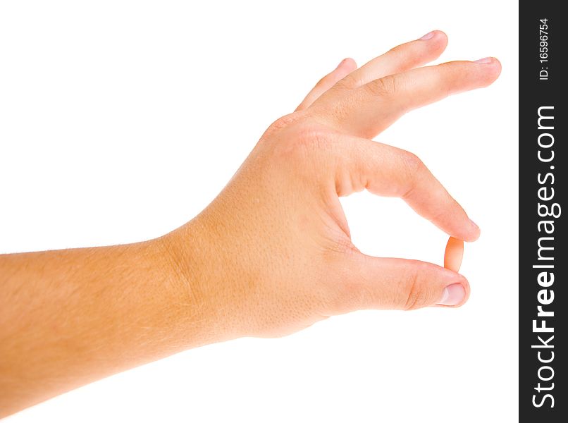 Hand holding pill doctor on a white background. Hand holding pill doctor on a white background