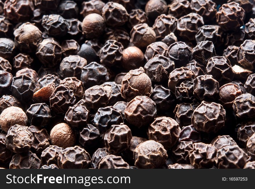 Different color and size peppercorns macro