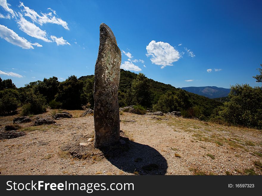 Sacred raised stone on top of a hill, south of France