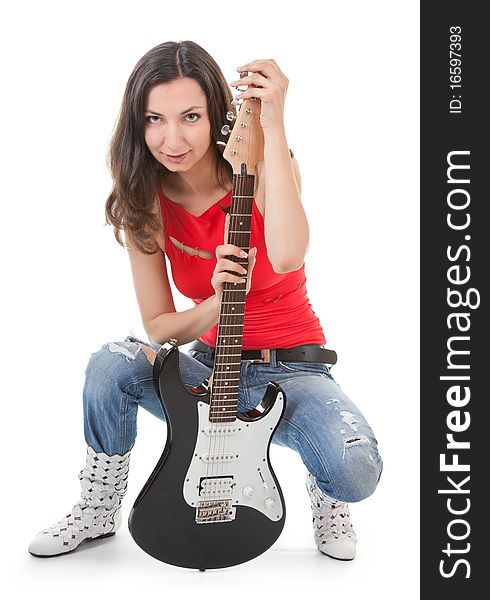 Girl with a guitar on a white background