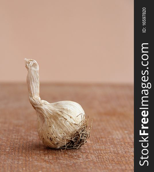 Macro view of garlic on a wooden structure