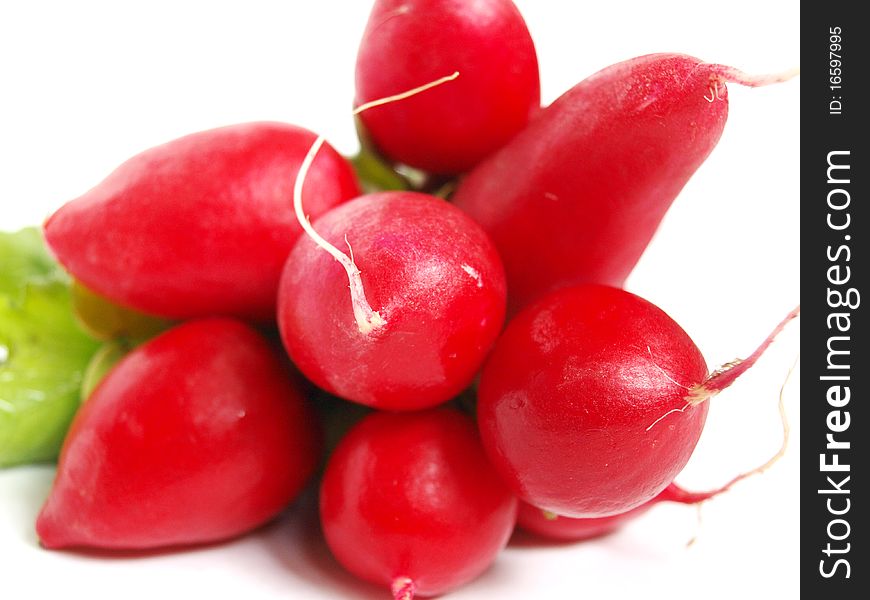 Red radishes isolated on white background