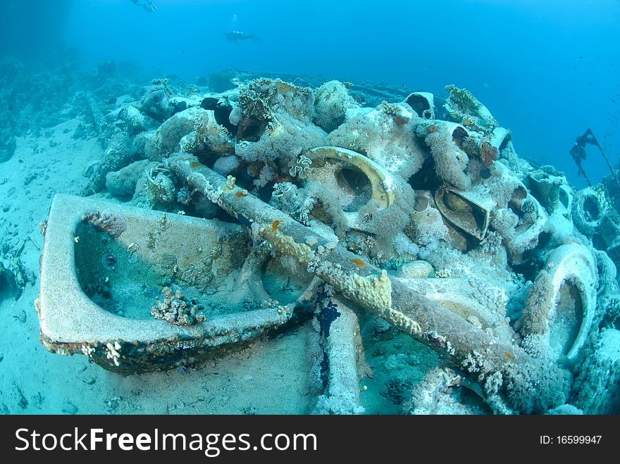 The Cargo of the Yolanda shipwreck scattered over the ocean floor. Red sea, Egypt. The Cargo of the Yolanda shipwreck scattered over the ocean floor. Red sea, Egypt.