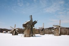 Windmill In The Winter Hills Stock Photos