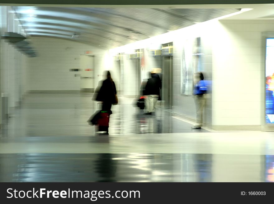 Passenger moving at the airport, motion blur. Passenger moving at the airport, motion blur