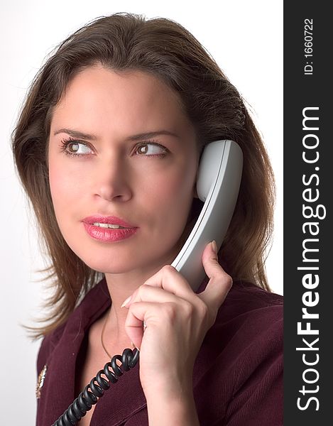 Pretty brunette secretary  with telephone headset. Pretty brunette secretary  with telephone headset