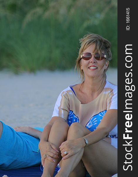 Woman at the beach in a coverup