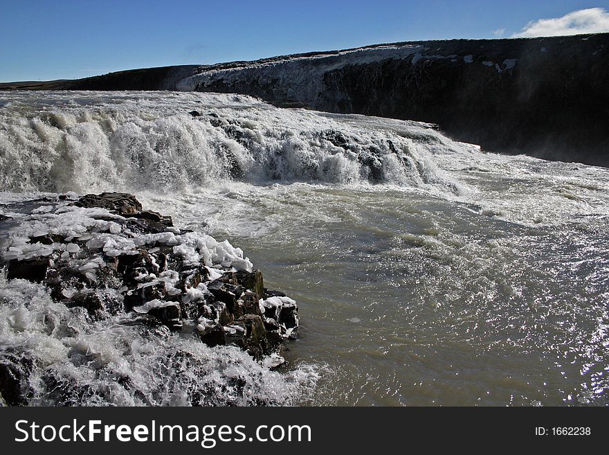 Gullfoss is a waterfall located on the White River (HvÃ­tÃ¡) in south central Iceland. Gullfoss is also by far Europeâ€™s most powerful waterfall. Gullfoss is an example of a waterfall forming where the water has followed a fissure in thelava and carved a passageway through it. Gullfoss is a waterfall located on the White River (HvÃ­tÃ¡) in south central Iceland. Gullfoss is also by far Europeâ€™s most powerful waterfall. Gullfoss is an example of a waterfall forming where the water has followed a fissure in thelava and carved a passageway through it