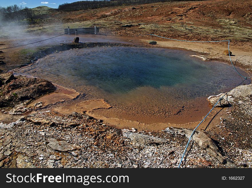 Iceland  - in a geothermal spot with various hotsprings. Iceland  - in a geothermal spot with various hotsprings