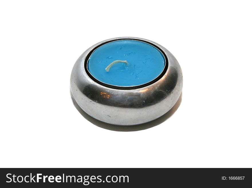 Metal candle holder with blue candle inside