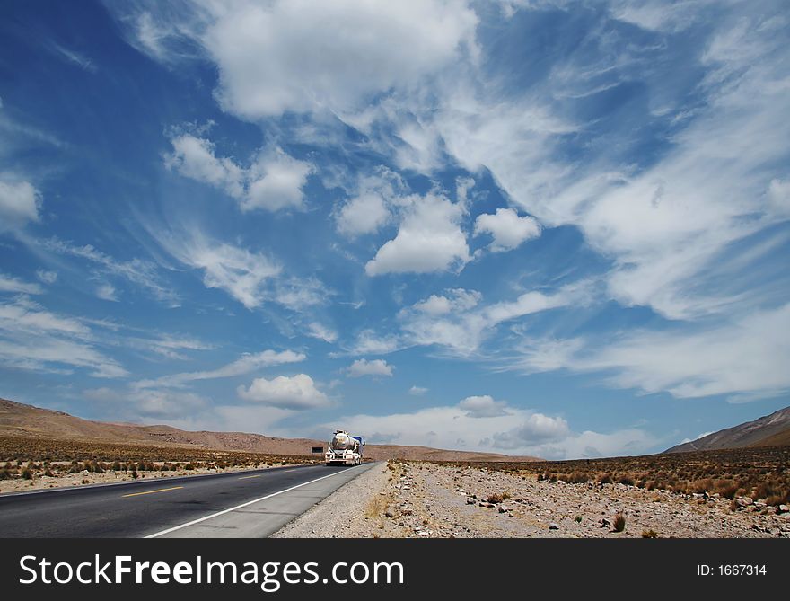 Road along Andes desert in Peru