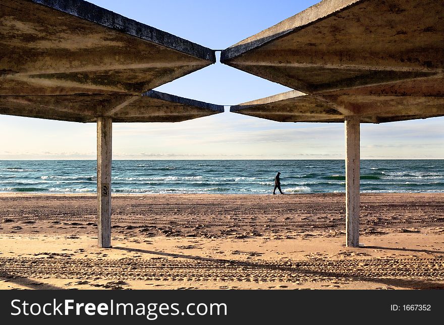 Concrete tent on a background of winter beach. Concrete tent on a background of winter beach