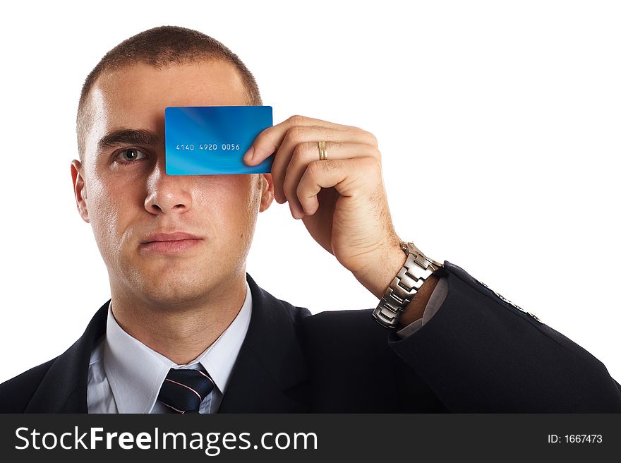 Young Modern Businessman portrait with credit card in front of his face