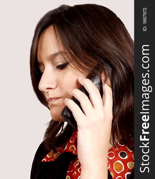 Young woman talking by phone worried