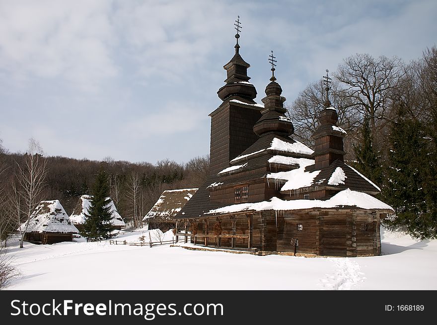 Old wooden church in the snowy countryside lndscape. Old wooden church in the snowy countryside lndscape