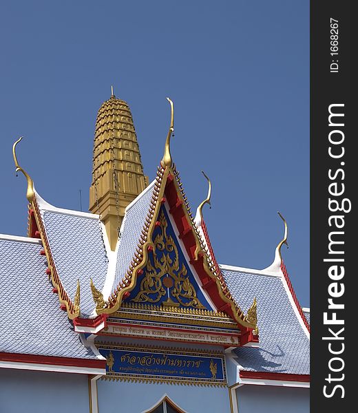 Detail of blue and gold Buddhist temple in Thailand. Detail of blue and gold Buddhist temple in Thailand