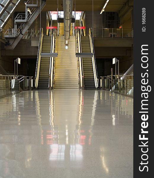 Escalators at a nearly empty urban metro station