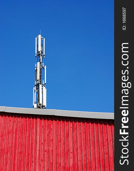 Communication Tower And Red Wall