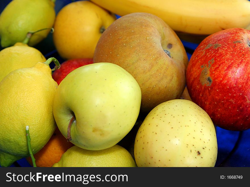 Several fresh fruits mixed in a bowl