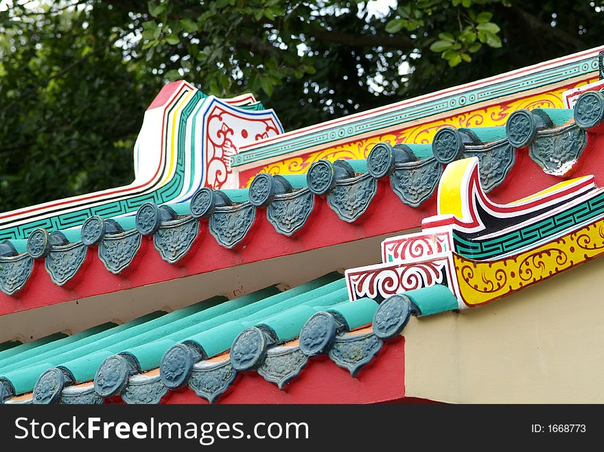 Roof detail of colourful Chinese temple in Thailand. Roof detail of colourful Chinese temple in Thailand