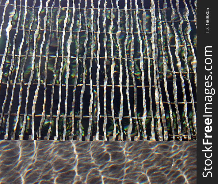 Abstract of a steel grate under water