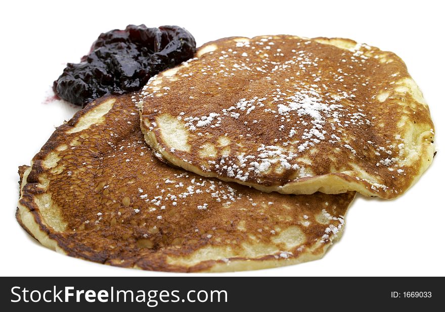 Two pancakes with jam on morning meal