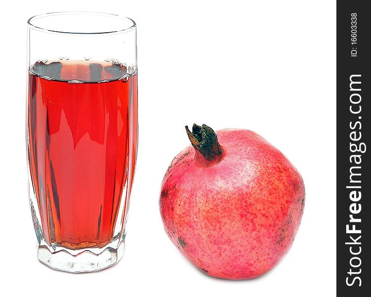 Pomegranate juice in a glass isolated on a white background.