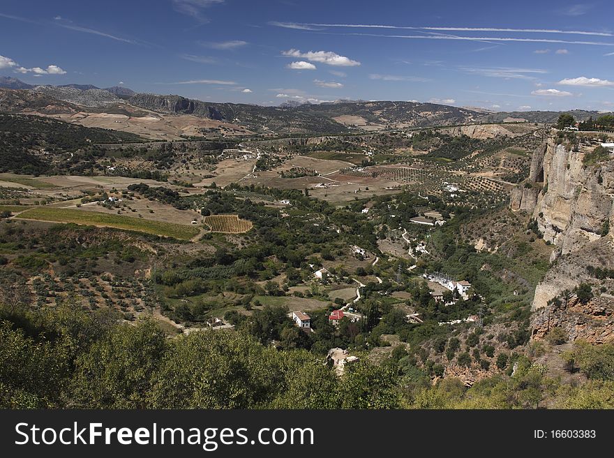 The view of countryside situated below the andalusian city Ronda in Spain. The view of countryside situated below the andalusian city Ronda in Spain.