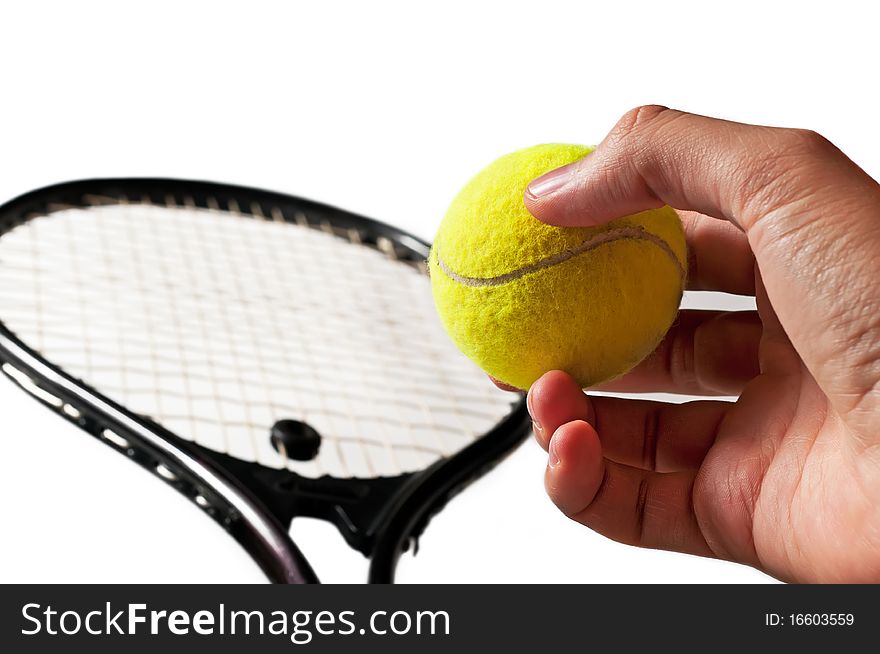 Tennis racket and the hand holding the ball. Isolated on a white background. Tennis racket and the hand holding the ball. Isolated on a white background