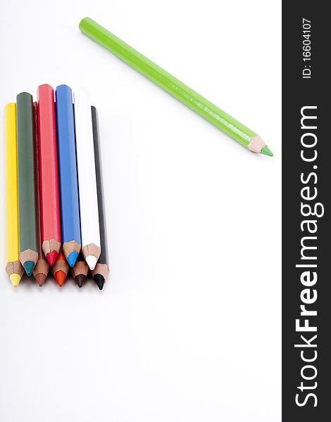 Many colour pencils close up