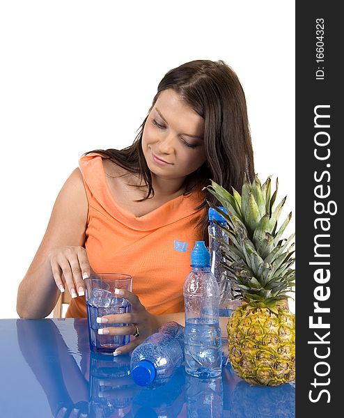 Woman drinking healthy mineral water.Demonstration of healthy nutrition. Woman drinking healthy mineral water.Demonstration of healthy nutrition