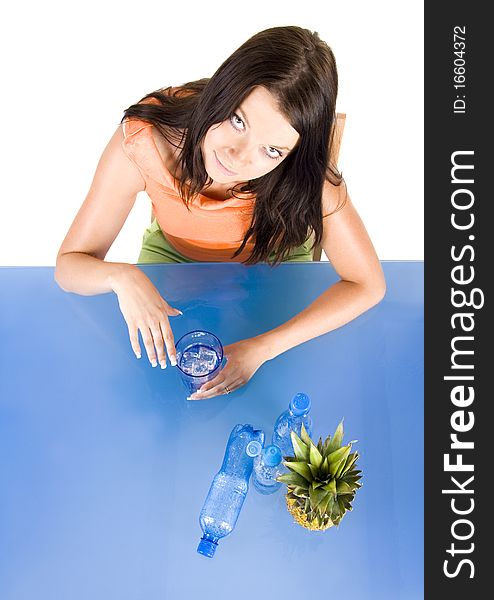 Woman drinking healthy mineral water.Demonstration of healthy nutrition. Woman drinking healthy mineral water.Demonstration of healthy nutrition