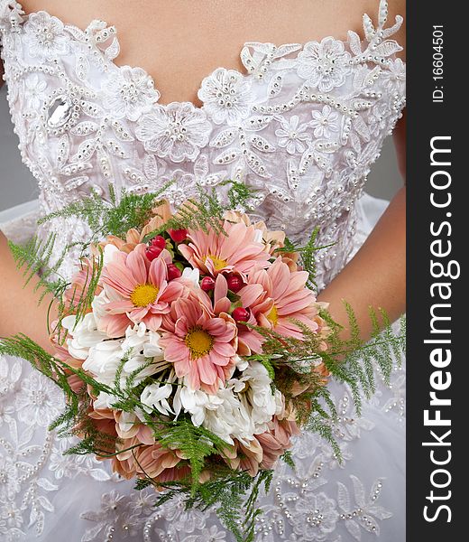 Close-up of wedding bouquet at bride's hands