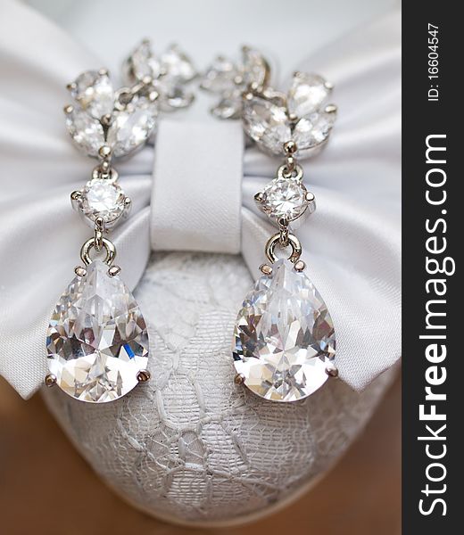 Wedding details. silver ear-rings with large diamonds