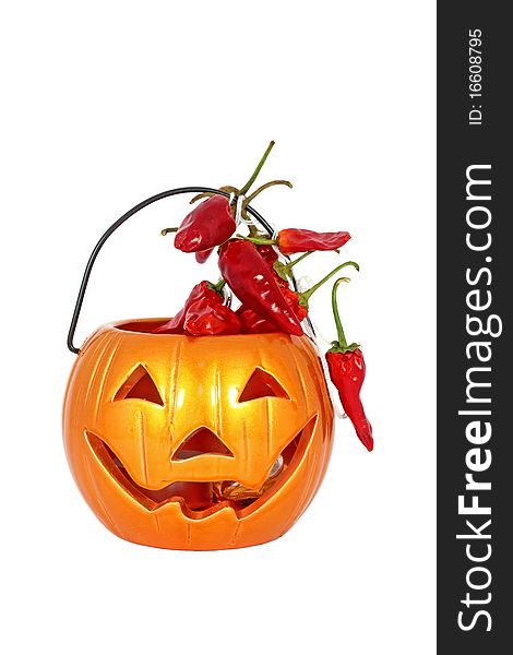 Little halloween lamp with red chilly pepper isolated on white