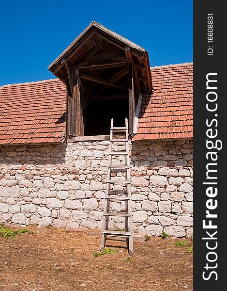 Back of the horse stables with ladder to climb up to the attic. Back of the horse stables with ladder to climb up to the attic