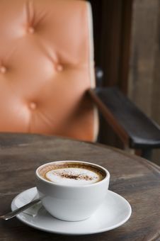 Cappuccino With Orange Armchair Background Stock Photo Cappuccino With Orange Armchair Background Stock Photo