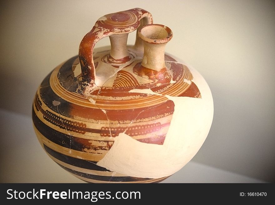 Details of decorative, restored Greek urn