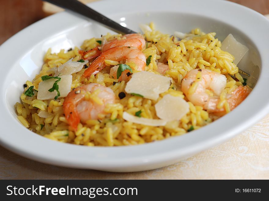 Spiced prawn and coconut pilaf in a bowl. Spiced prawn and coconut pilaf in a bowl