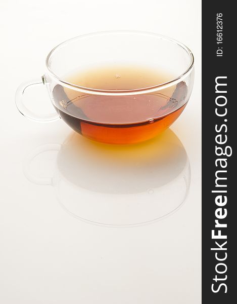 Cup of tea on white background