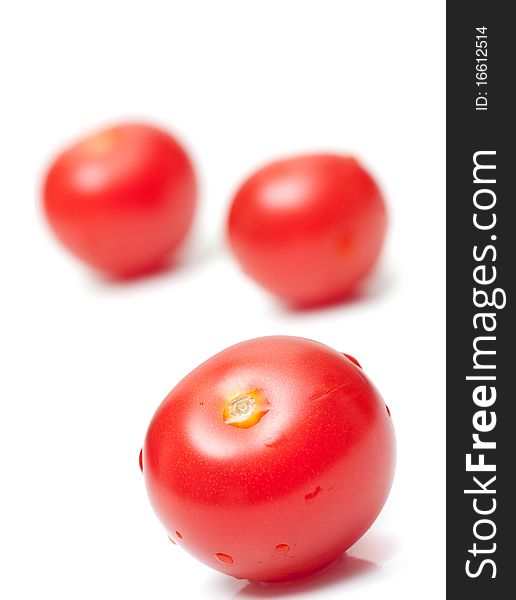 Fresh red tomatoes on white background. Fresh red tomatoes on white background