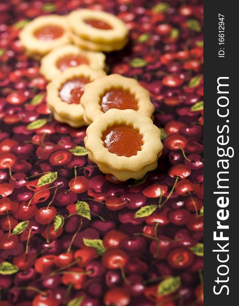 Cherry cookies, on cherry tablecloth