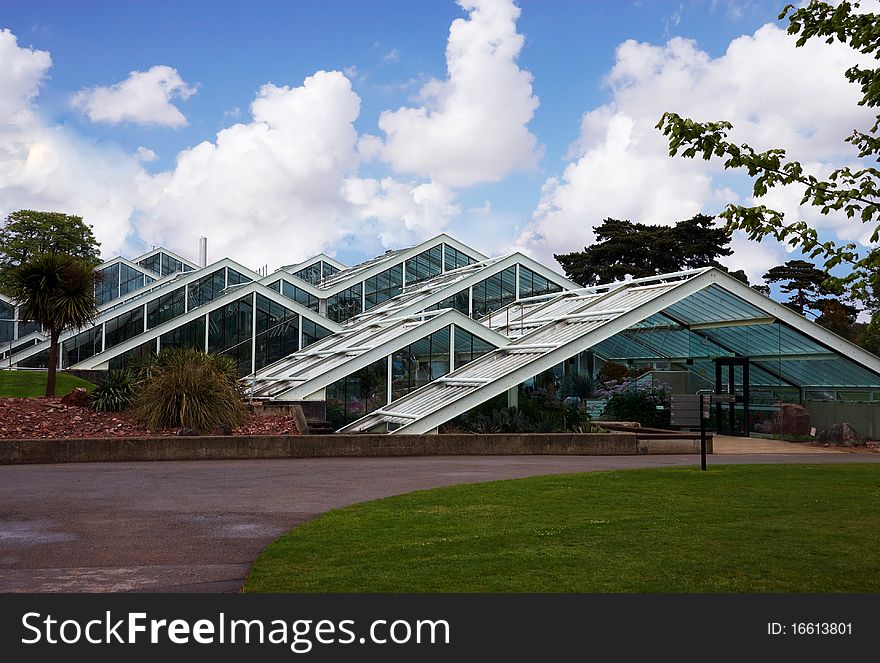 Triangle green house in a botanical garden. Triangle green house in a botanical garden