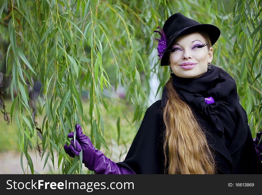 Beautiful girl in the autumn park