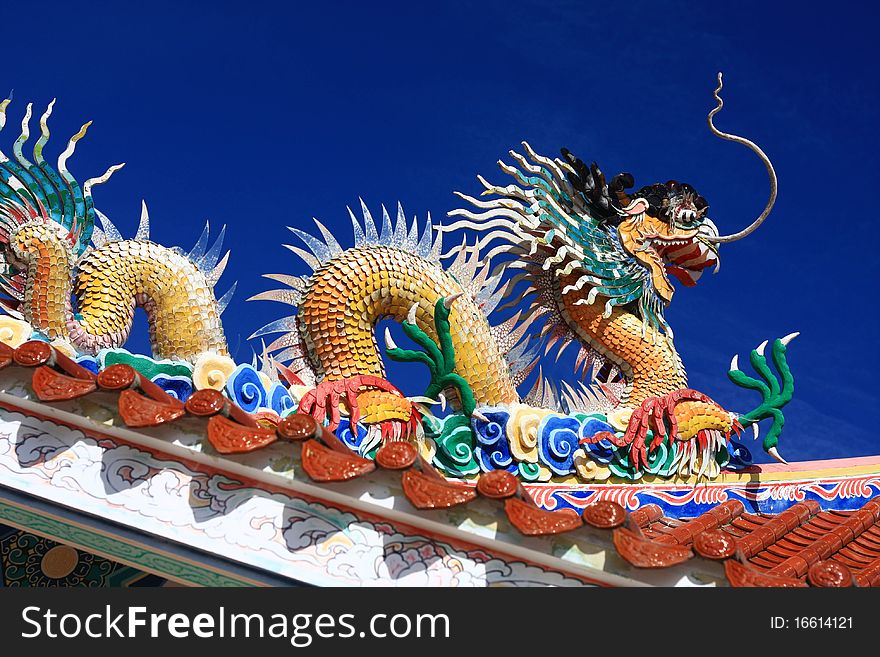 Golden dragon on the roof in chinese temple