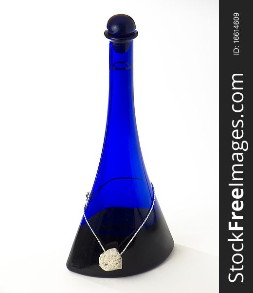Blue Bottle With A Stone